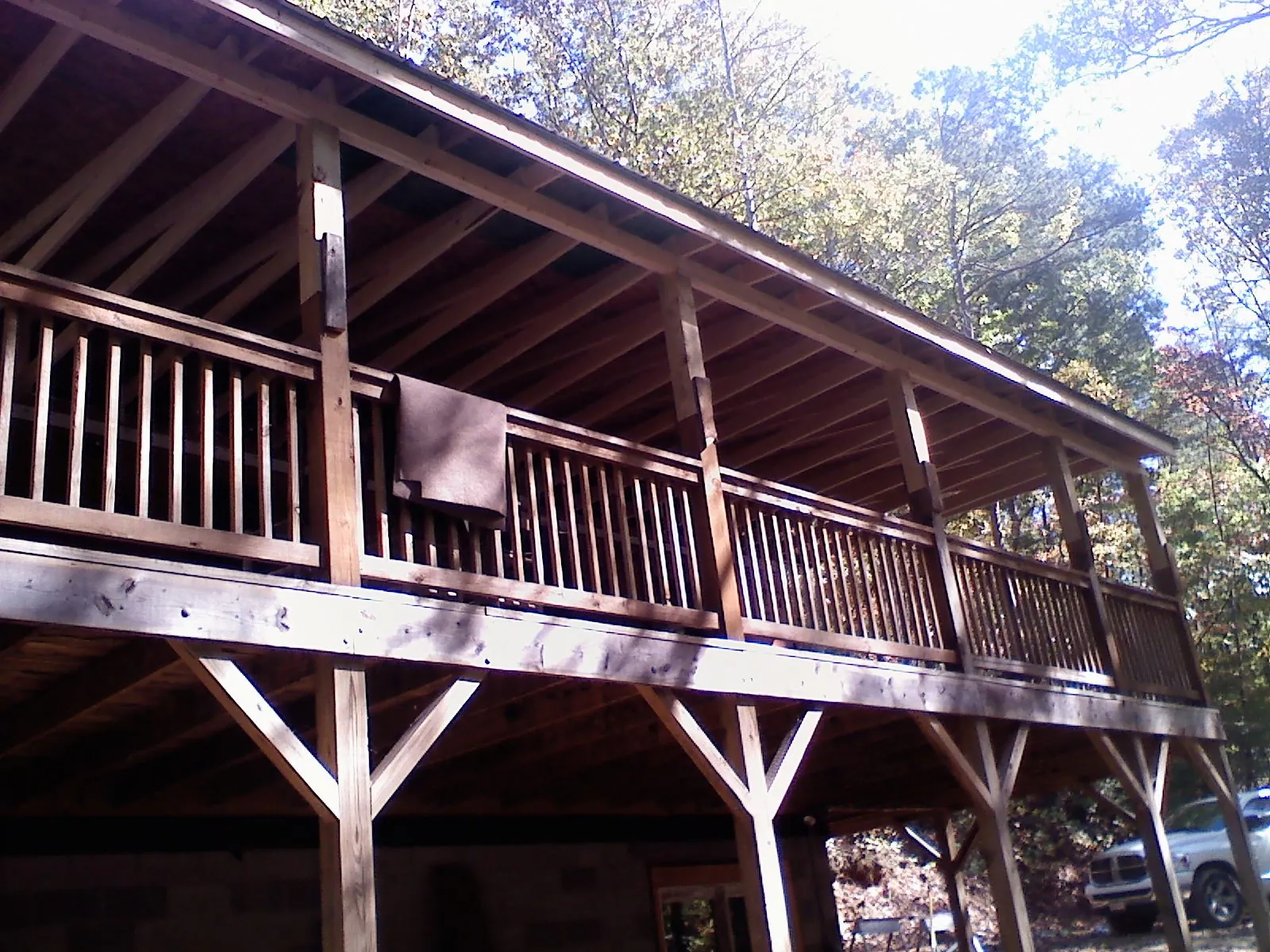 Timber framing under a new elevated porch and deck — Roof Leak Repair in Miller Place by Roofing Brothers
